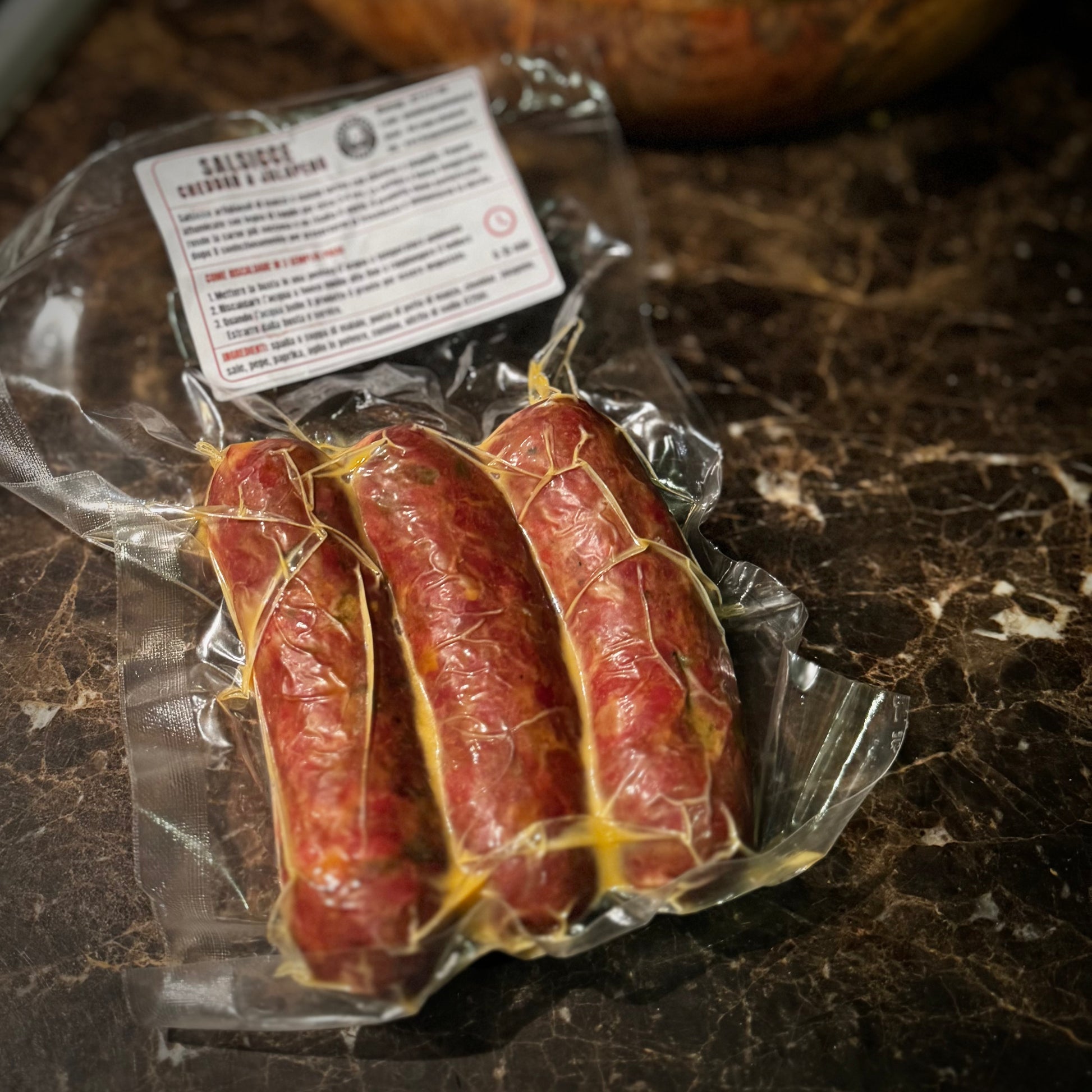 Tre salsicce Jalapeño & Cheddar  affumicate con legna di faggio confezionate